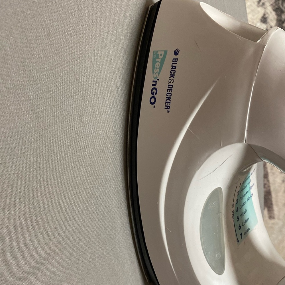 Black and Decker press n go iron. Tabletop ironing board.